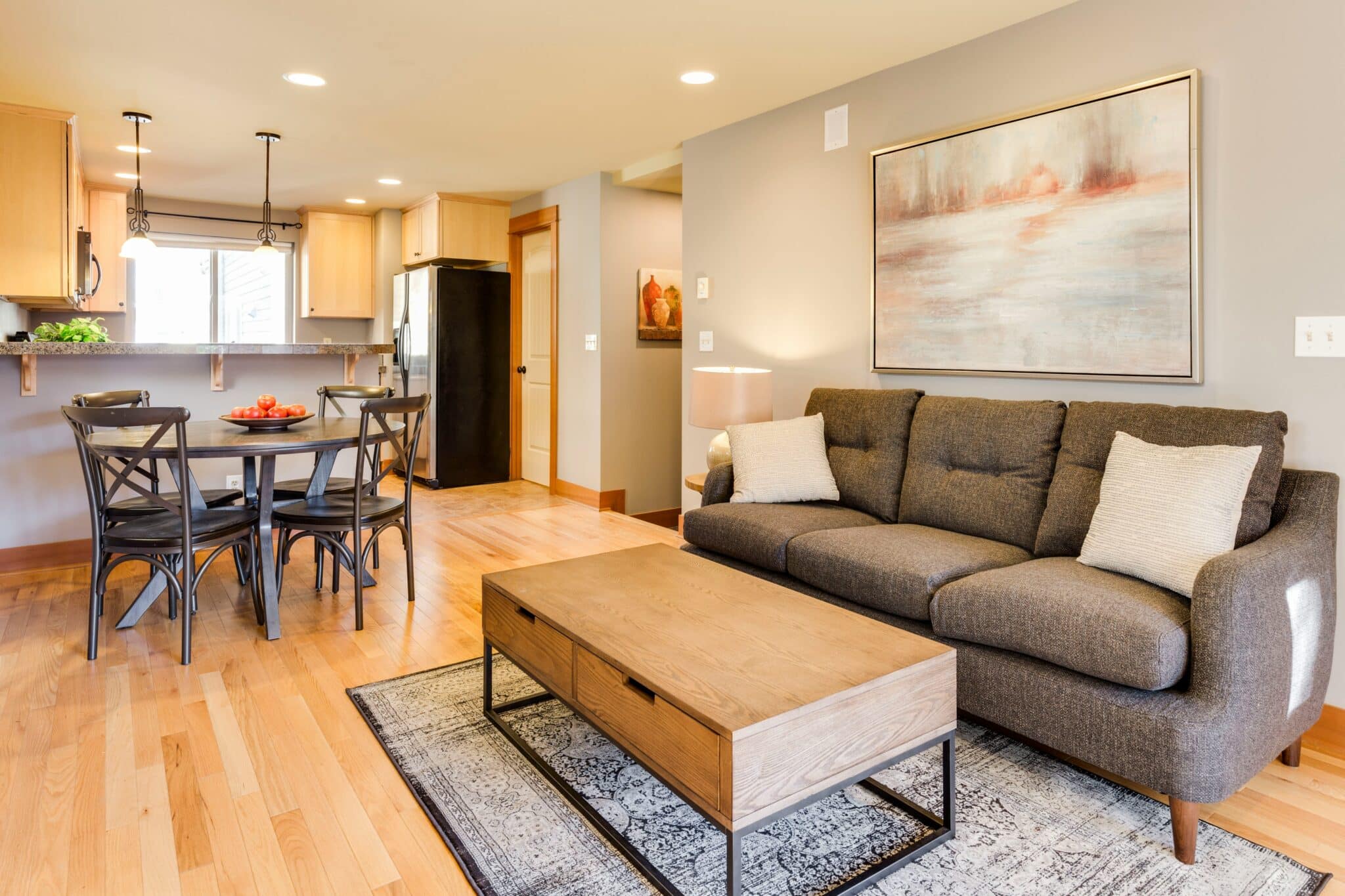 Cozy living and dining space with warm autumn tones
